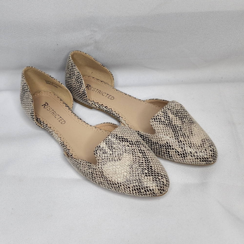 Restricted shoes size 7.5  color animal print
